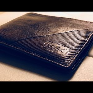 Yves Saint Laurent wallet. Cocoa leather.